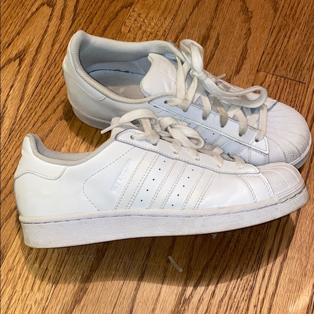 All white adidas superstars